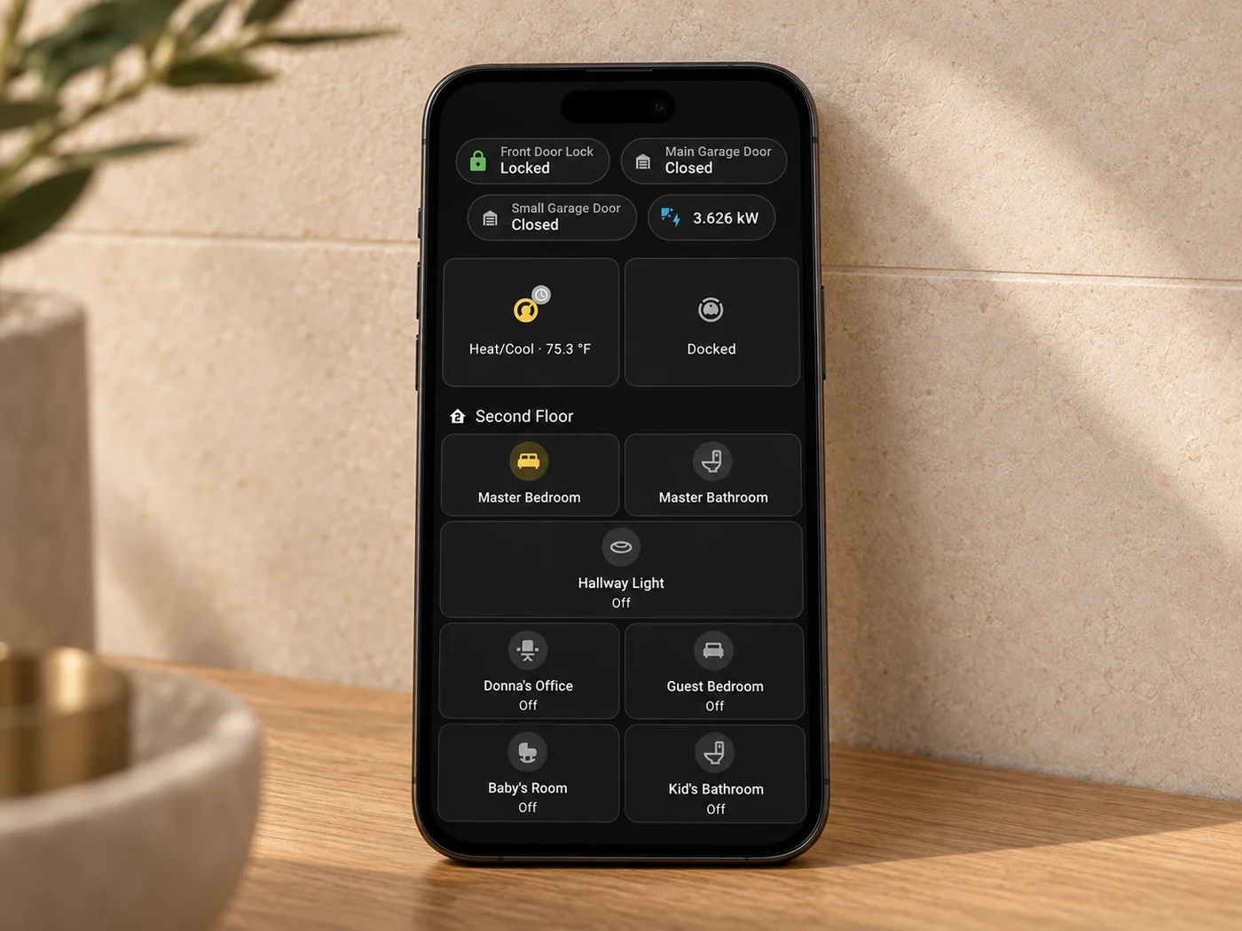 Phone displaying a home control dashboard in an oak and limestone interior